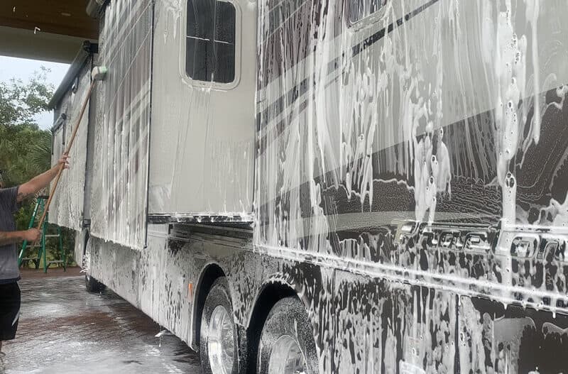 RV exterior being washed from top to bottom